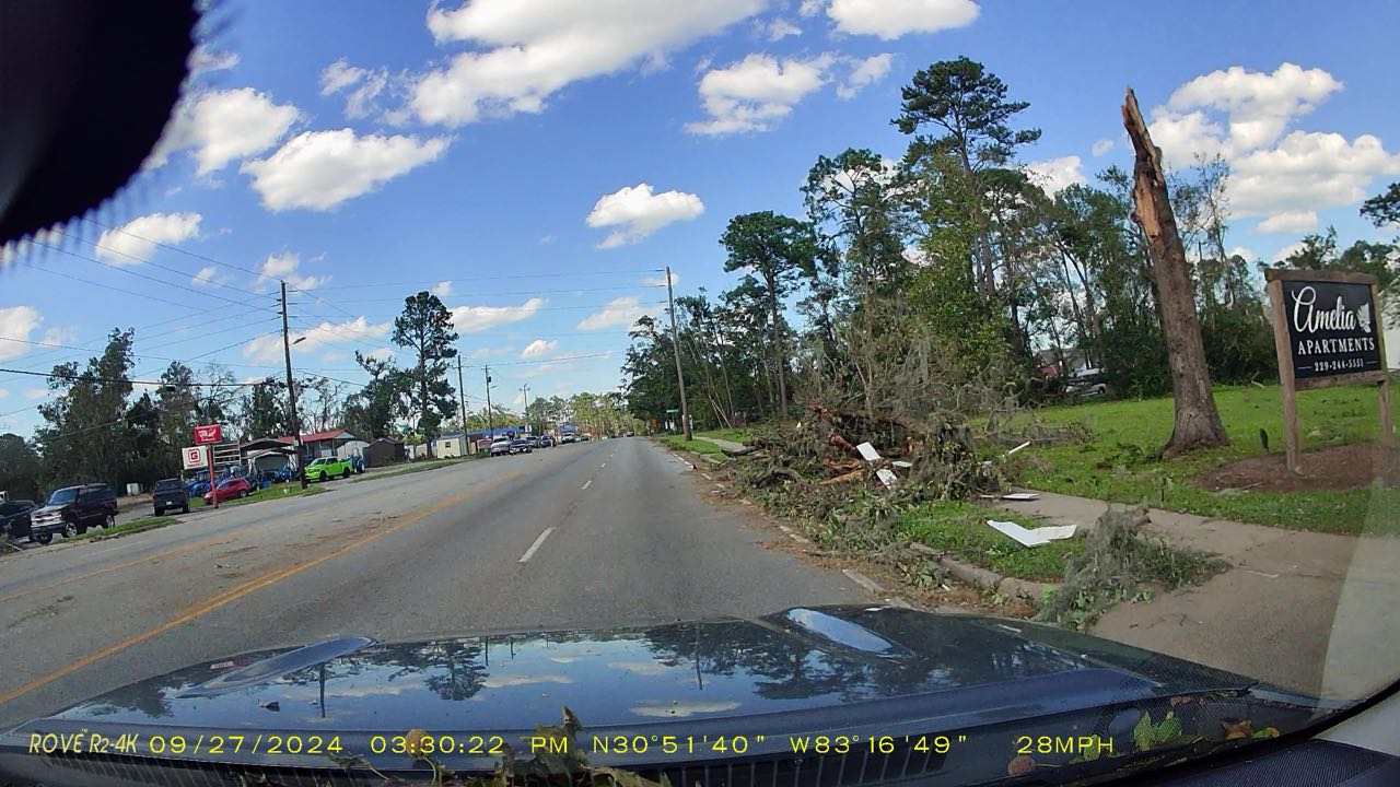 Damaged tree and road debris along N Bemiss Road in Valdosta, Georgia following Hurricane Helene, September 2024